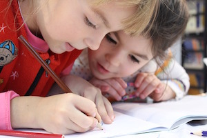 The secret of speedy revision - photo of two children writing